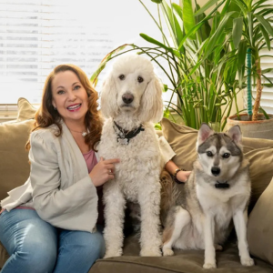 The Harmonius Pet image of founder Hope Lewis with her dogs