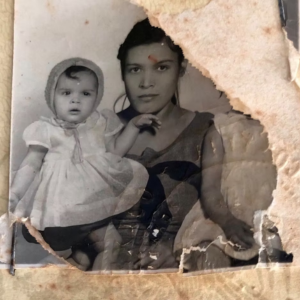 Courageous Corazon image of founder Mary Avaolos's mother's passport picture